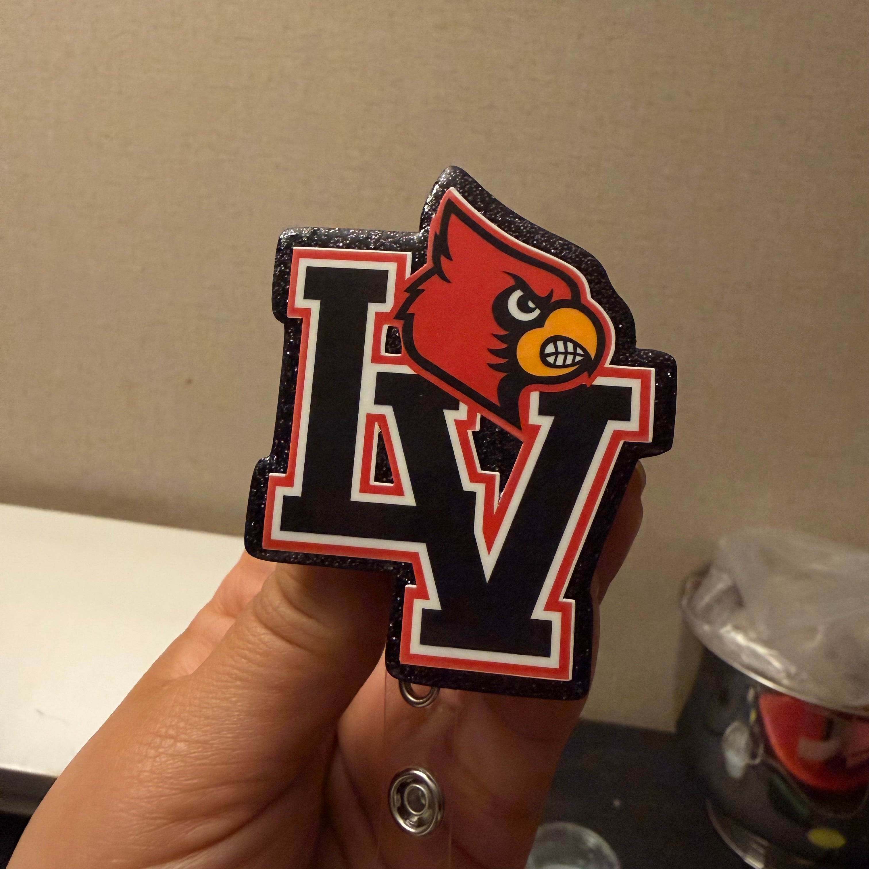 LV Red Bird-badge reel & topper