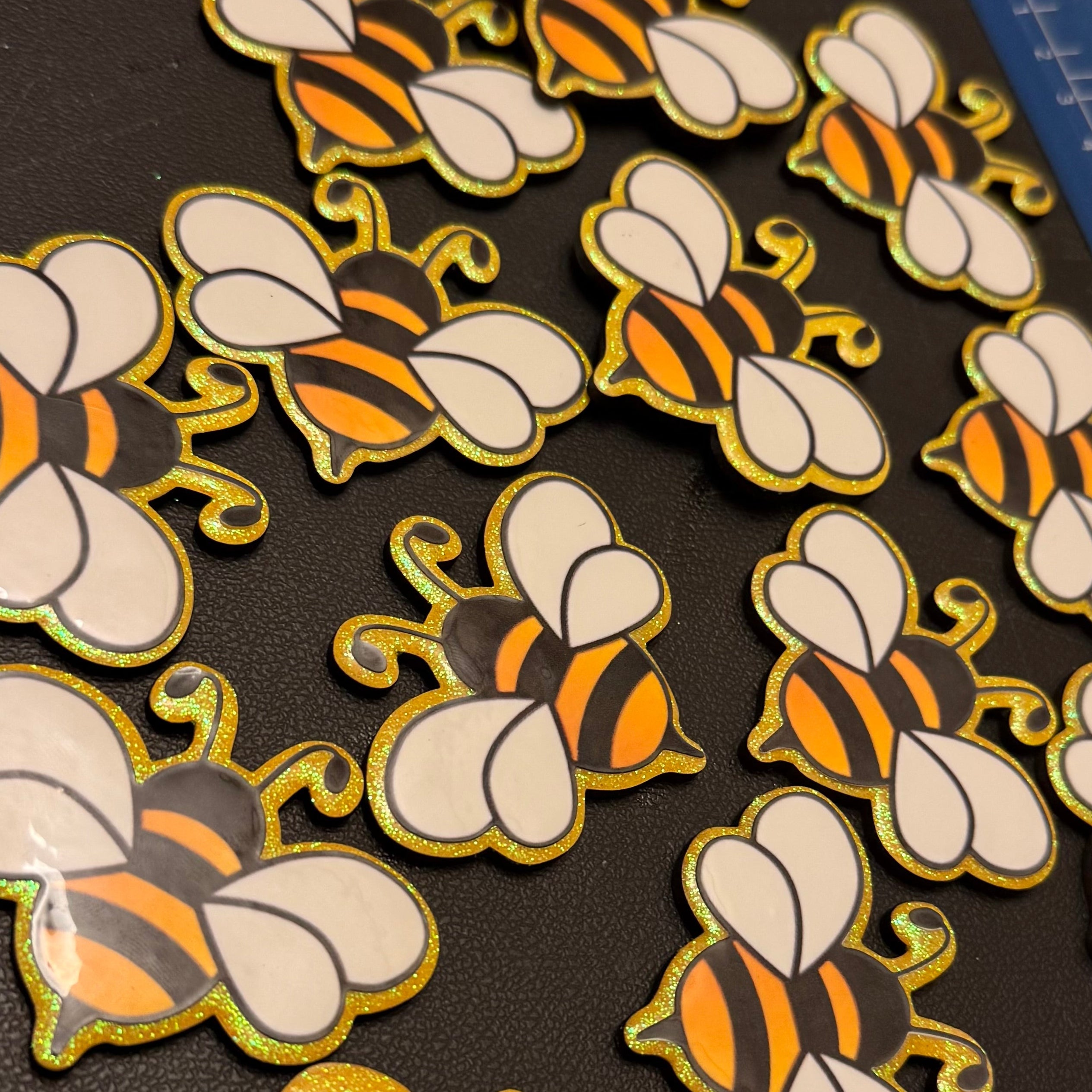 Glitter bee-badge reel & topper