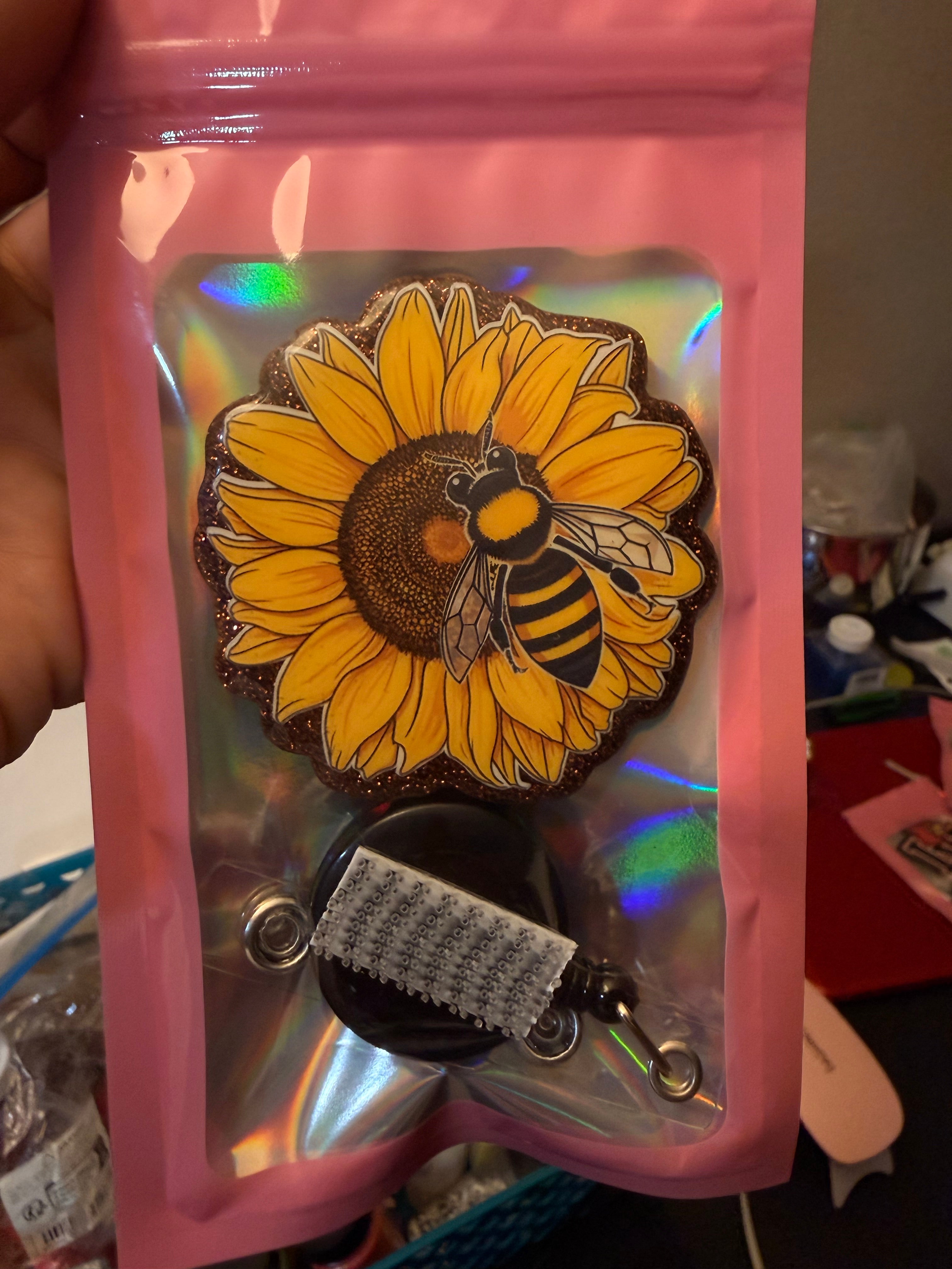 Sunflower bee-badge reel & topper